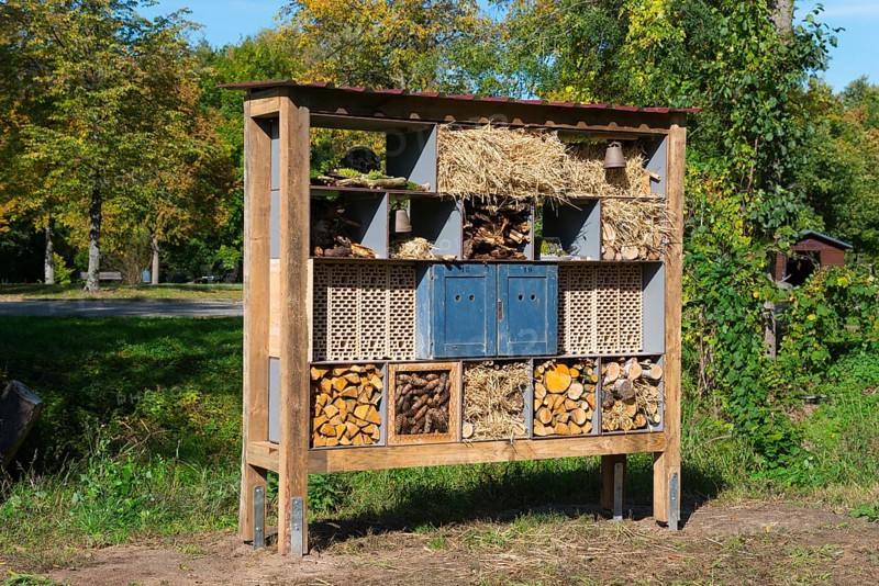 Large wooden insect hotel in an autumn garden, Magdeburgerforth, Jerichower Land, Saxony-Anhalt, Germany