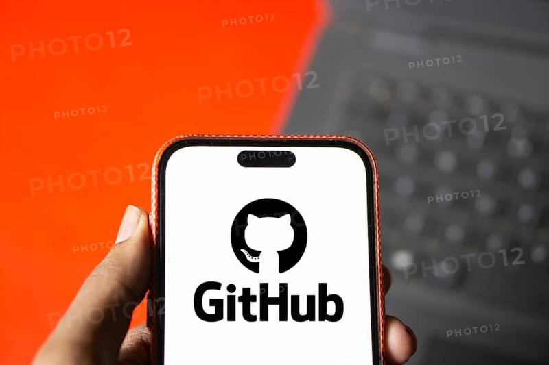 github logo is displayed on smartphone. GitHub is a proprietary developer platform