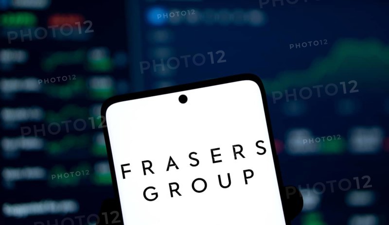 Frasers group logo is displayed on smartphone. Frasers Group plc is a British retail, sport and intellectual property company.