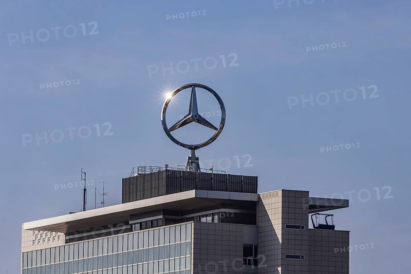 Mercedes star with sun star. Building at the headquarters of Mercedes-Benz Group AG in Untertürkheim, Stuttgart, Baden-Württemberg, Germany