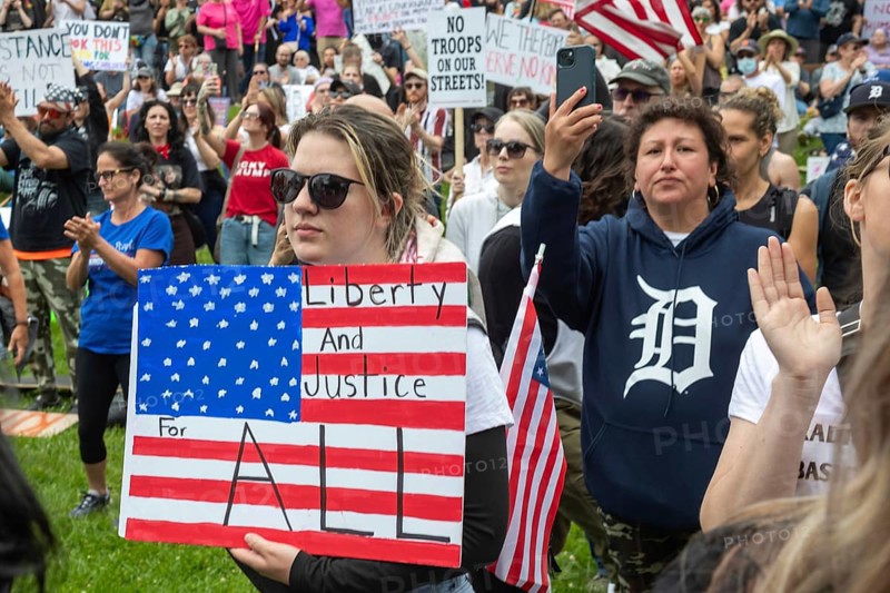Detroit, Michigan USA - 14 June 2025 - Thousands gathered for a 'No Kings' rally, protesting President Trump's actions against immigrants and against democratic institutions