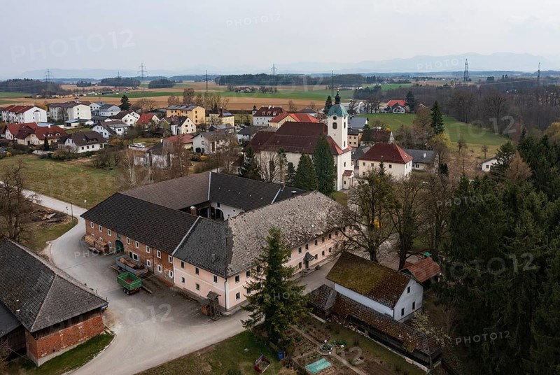 Drone shot, view of village, parish church, Schiedlberg Traunviertel, Upper Austria, Austria