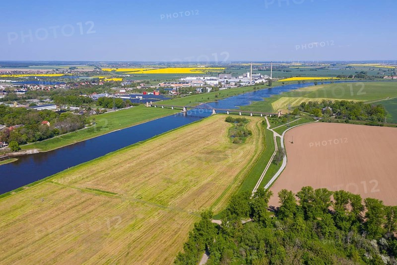 Aerial view of the Elbe with railway bridge and industrial area Torgau, Saxony, Germany
