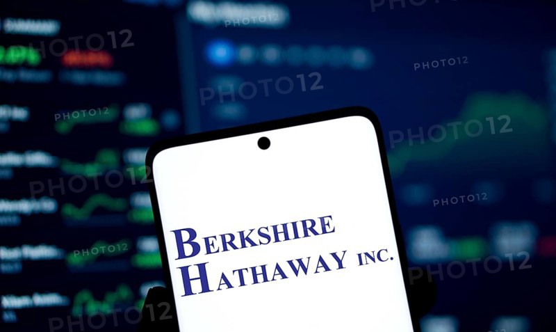 Berkshire Hathaway inc logo is displayed on smartphone. Berkshire Hathaway Inc is an American multinational conglomerate holding company