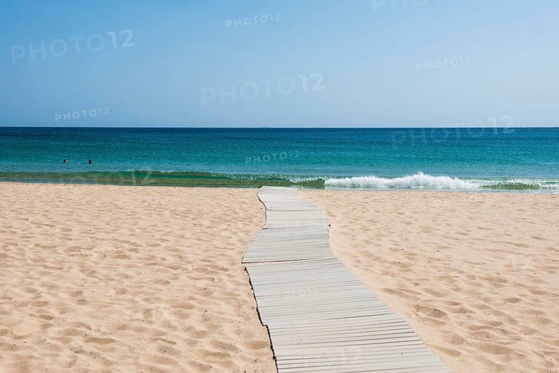 Sandy beach beach and blue sea, Spiaggia di Su Portu, Torre di Chia, Chia, south coast, Sardinia, Italy