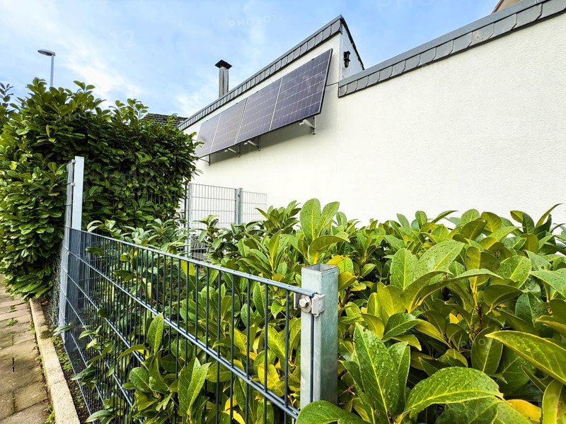 Solar panels on a house wall in Hilden, Germany