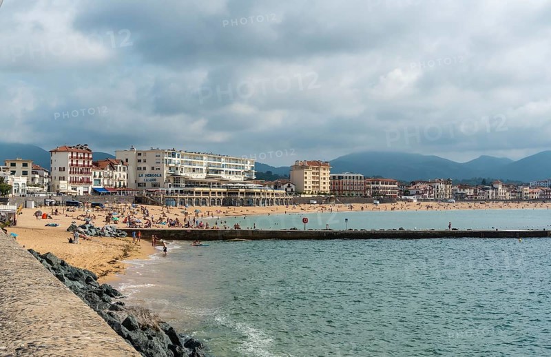 Summer in the Grande Plage in Saint Jean de Luz, holidays in the south of France, French Basque Country. France