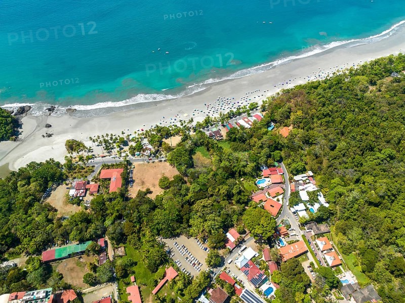 Aerial view, coast and town, Corrohoe Bay and Playa Espadilla, Manuel Antonio National Park, Puntarenas, Quepos, Costa Rica