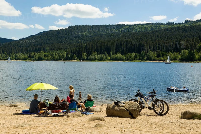 Lake in the mountains and beach in summer, Schluchsee, Black Forest, Baden-Württemberg, Germany