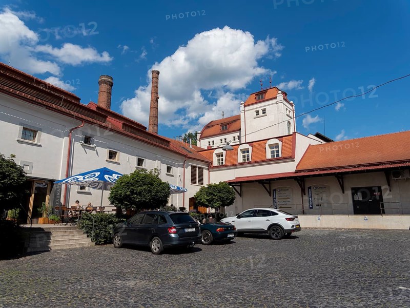 Old brewery buildings, car park in front of brewery, Cvikov, Ceská Lípa, Czech Republic