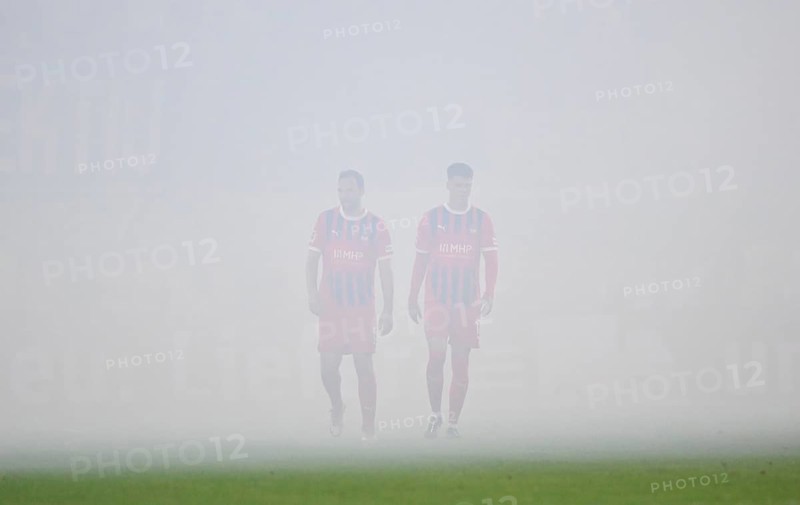 Benedikt Gimber 1. FC Heidenheim 1846 FCH (05) and Mathias Honsak 1. FC Heidenheim 1846 FCH (17) in the fog of Bengalos, pyrotechnics, pyro, fireworks, Voith-Arena, Heidenheim, Baden-Württemberg, Germany