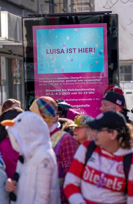 Rose Monday carnival parade in Düsseldorf, campaign against sexual assault, violence, at carnival, Luisa is here, Is Luisa here, code words to draw attention to harassment, assault