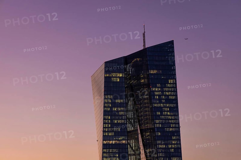 The lights in the offices of the European Central Bank (ECB) in Frankfurt am Main shine in the evening, Frankfurt am Main, Osthafen, Hesse, Germany