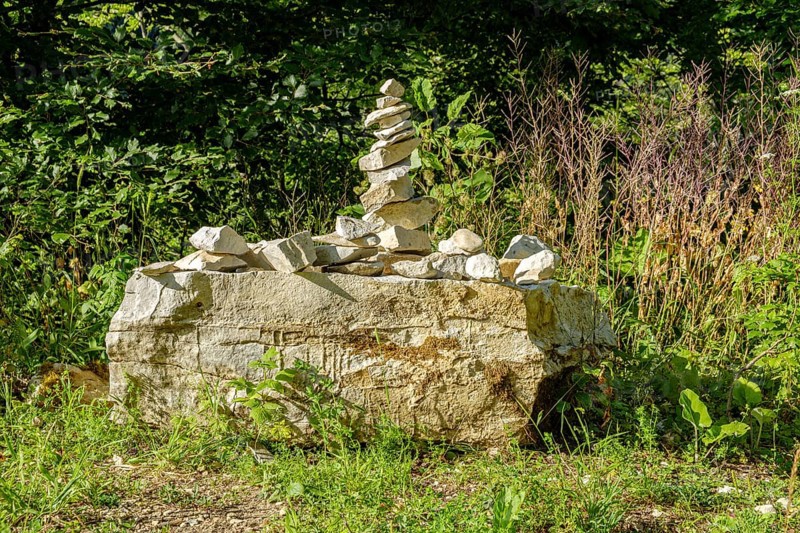 Cairn to mark the edge of the path, near the Schertelshöhle cave, Swabian Alb, Germany
