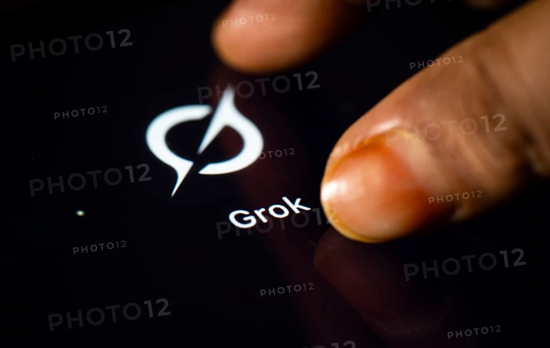 In this photo Illustration a person taps Grok AI application icon on a tablet device on 24 May 2025 in New Delhi, India
