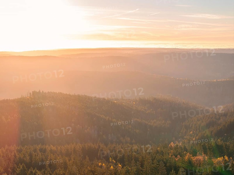 Light play of the sunrise over the wooded hills, quiet expanse, Black Forest, Germany