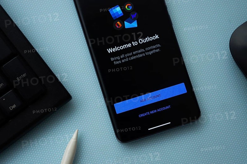 Dhaka, Bangladesh - 17 March 2025: The app of the microsoft outlook is displayed on a smartphone screen