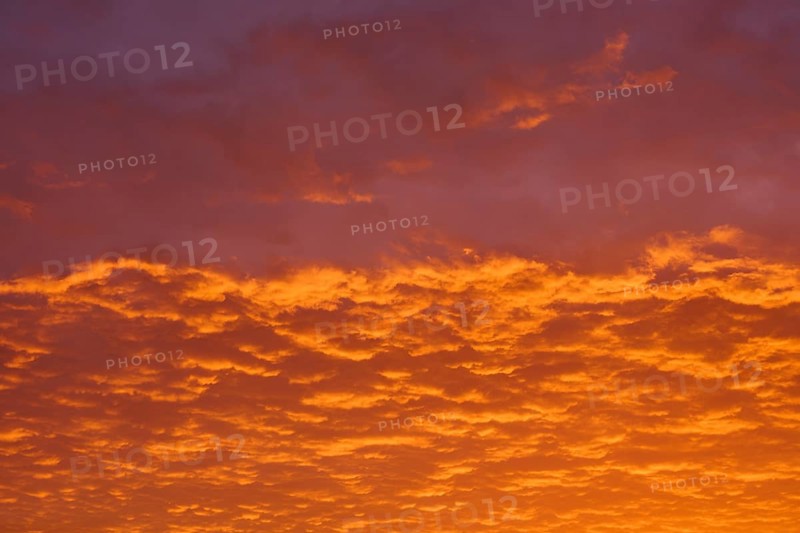 Dramatic sky with orange-red clouds at sunrise, Großheubach, Miltenberg, Main, Spessart, Bavaria, Germany
