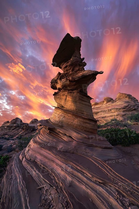 Stunning sunset with fiery skies illuminating the unique rock formations of Coyote Buttes in the Paria Canyon-Vermilion Cliffs in Arizona
