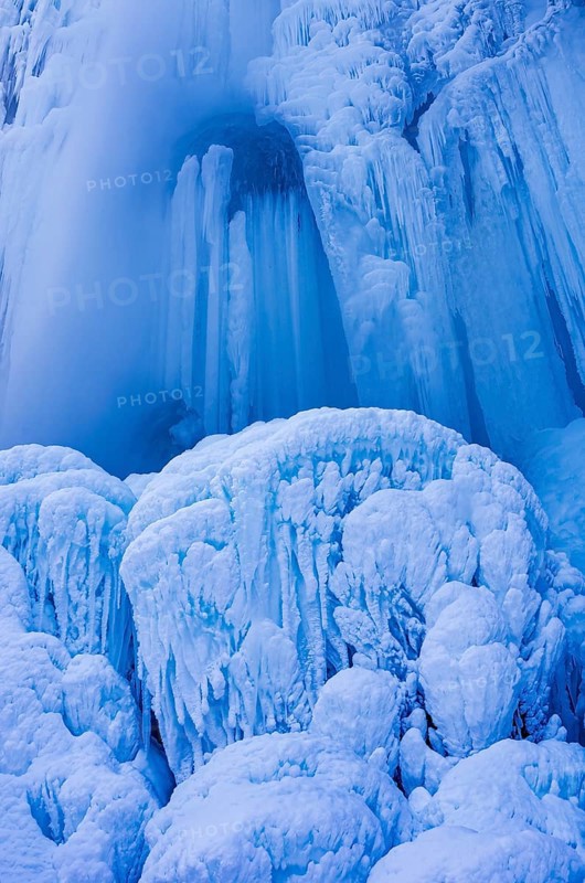 Urach waterfall full of bizarre ice formations frozen at winter temperatures, Bad Urach, Swabian Jura, Baden-Württemberg, Germany
