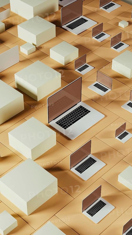 Multiple laptops rest on a geometric background made of tiles, showcasing a modern and abstract design