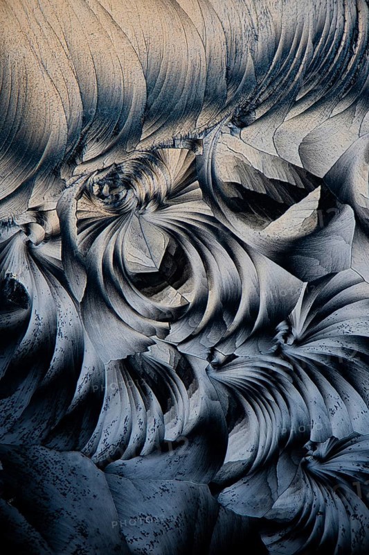 Captivating image showcasing the intricate textures and patterns of Salicylic acid microcrystals under a microscope, highlighting its delicate structure