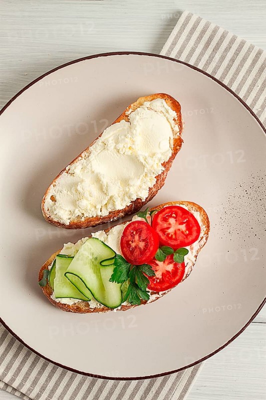 Sandwich, with cream cheese, homemade, on a cutting board, rustic style, no people, selective focus, breakfast