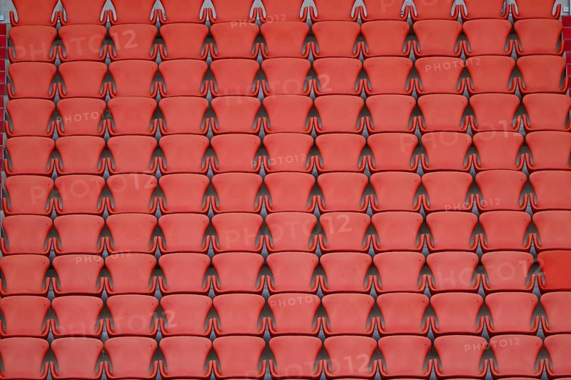 Empty seats in the main stand, red, soccer Bundesliga, Allianz Arena, Munich, Bayern, Germany