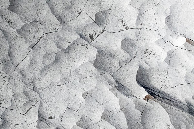 Aerial view of the pumice field in Catamarca, Argentina, featuring dramatic landscapes. Weathered volcanic formations create a stunning, textured terrain