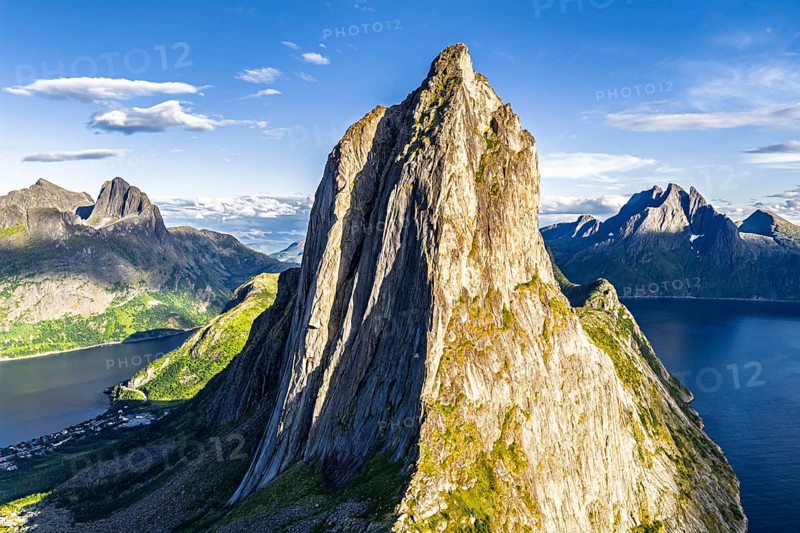 Aerial view of Mt. Segla, in the back Mt. Breidtinden, Senja Island, Norway