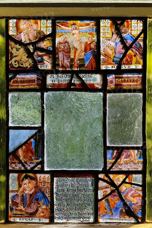 Parts of a church window, historical and partly destroyed church window, Protestant St. Andrew's Church, Eningen unter Achalm, Baden-Württemberg, Germany