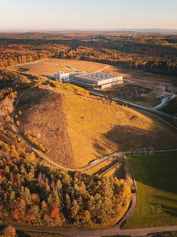 Landscape with factory on a hill in autumnal surroundings, Gechingen, Black Forest, Germany
