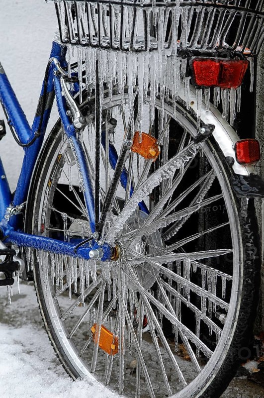 Bicycle icy due to freezing rain, icicles, detailed view