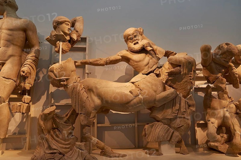 West pediment of the Temple of Zeus, battle between lapiths and centaurs, Greek ancient marble sculptures depicting a mythological battle scene, Olympia Archaeological Museum, Ancient Olympia, Olympia, Peloponnese, Greece