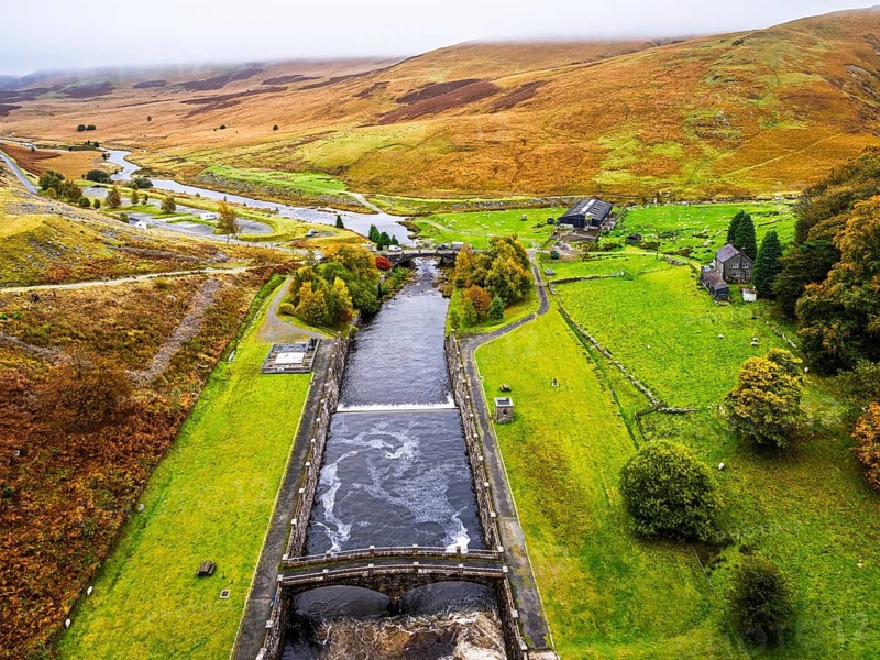 Autumn colors over Claerwen Dam, Claerwen Valley, Elan Valley Reservoir, Rhayader, Powys, Wales, UK