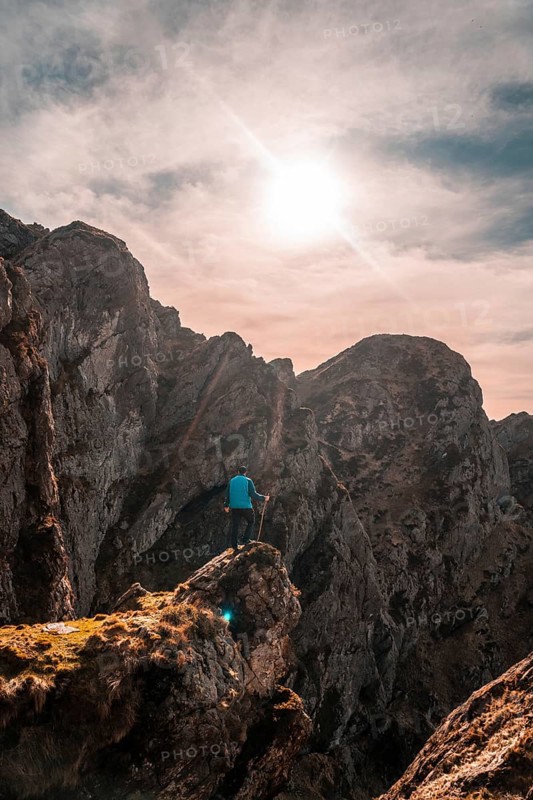A hiker at the top of the mountain of Aiako Harria or Peñas de Aya in the town of Oiartzun, Guipúzcoa. Basque Country