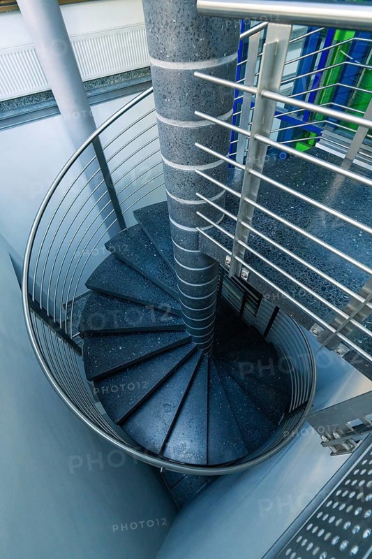 Modern metal spiral staircase in a bright interior, Sindelfingen, Böblingen district, Germany
