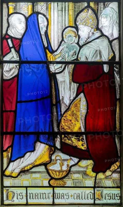 Detail of stained glass window Resurrection by Burlison & Grylls c 1880, Kelsale church, Suffolk, England, UK, baby Jesus is named