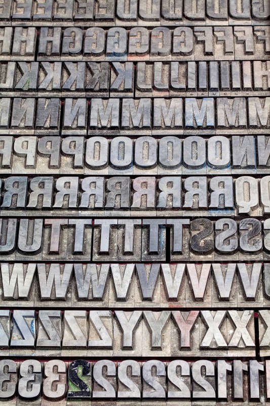 Hot metal printing setting, old letters made of lead for letterpress printing, Lettern aus dem Buchdruck, Bleisatz