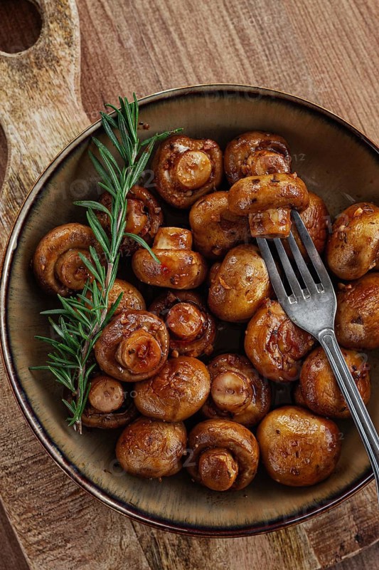 Fried mushrooms, with spices, in soy sauce, vegetarian food, homemade, no people
