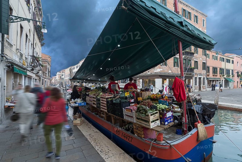 Selling fruit and vegetables from a boat, Venice, Veneto, Italy