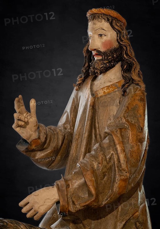 Palm tree donkey, wooden figure from 1470, on a dark background, Franciscan Museum, Villingen, Baden-Württemberg, Germany