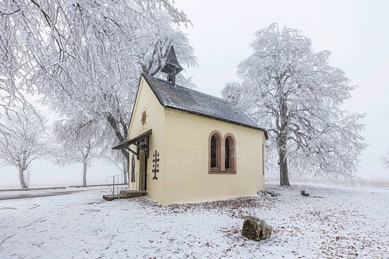 Schoenstatt Chapel Ennabeuren with hoarfrost in winter. Tourist attraction in the Swabian Jura. Heroldstatt, Baden-Württemberg, Germany