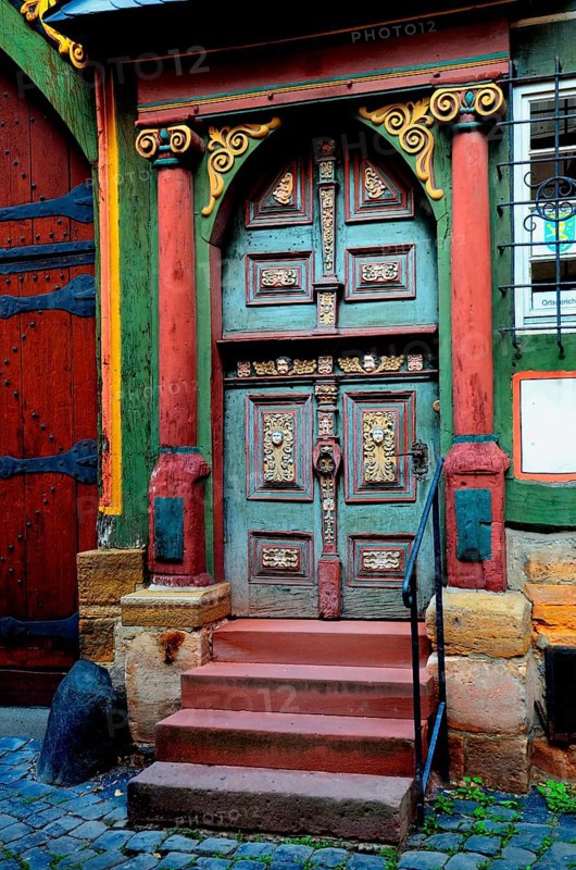 Renaissance door with painted wood carvings in a half-timbered house, historic centre, Alsfeld, Hessen, Germany