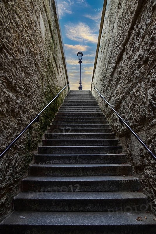 Lantern at the end of a staircase on Ile de la Cité in Paris, France