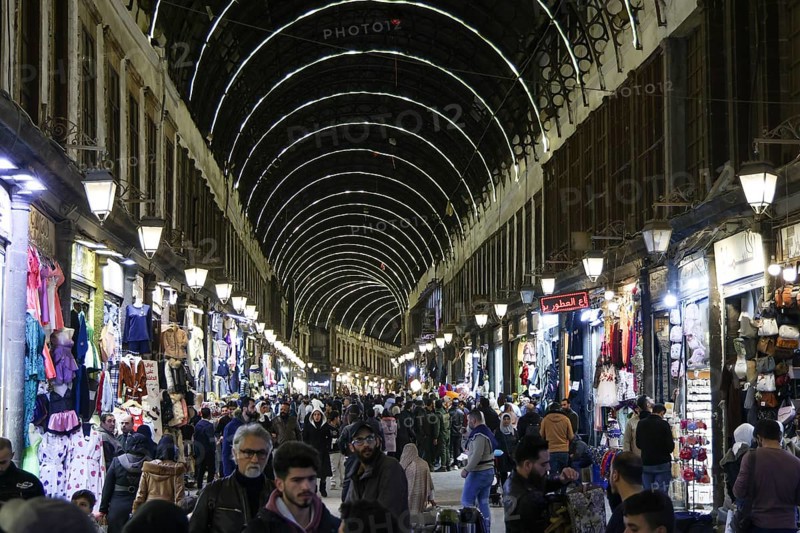 Syrians shop at the historic Al-Hamidiyah Bazaar adjacent to the Umayyad Mosque during the early days of Ramadan in Damascus, Syria on February 18, 2026, Damascus, Syria