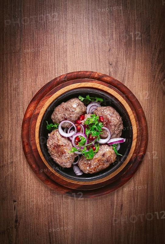 Fried apkhazura, cutlet in a fat grid, spicy, Georgian dish, fried on ketsi, homemade, no people