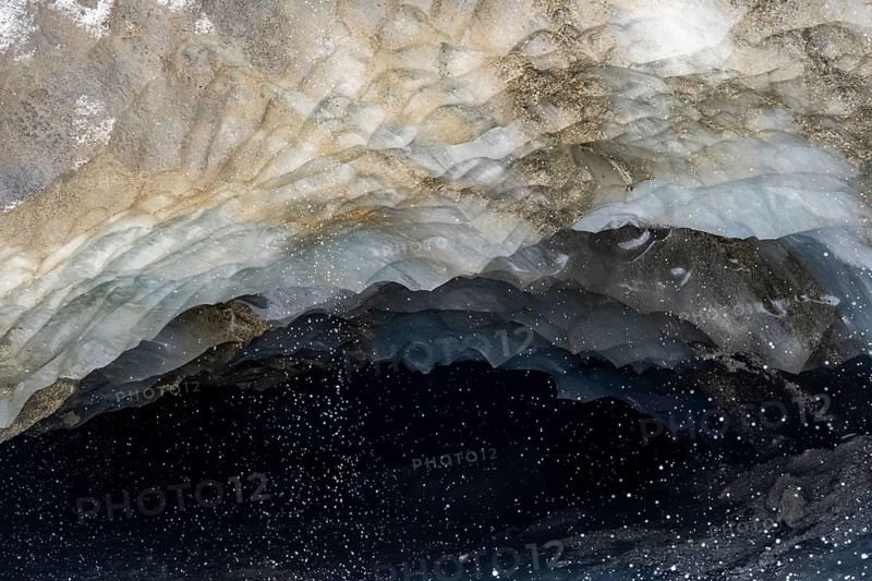 Meltwater at a glacier cave, underground glacier stream, Castner Glacier, Delta Range, Alaska Range, Richardson Highway, Alaska, USA