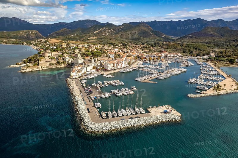 Marina and old town of Saint-Florent seen from above, Corsica, France