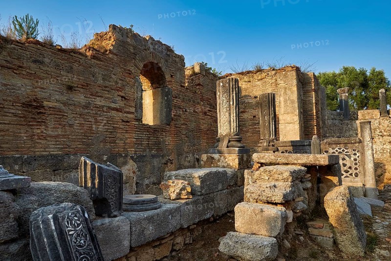 Phidias' workshop, ancient ruins with decorative columns against the blue sky, archaeological site, Ancient Olympia, Olympia, Peloponnese, Greece